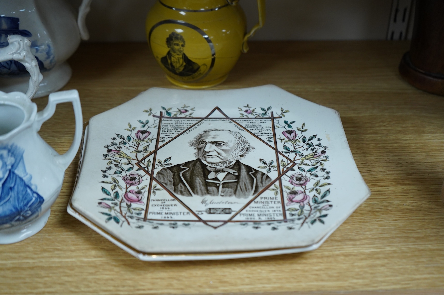 Eleven early to mid 19th century jugs, mugs and plates, all with transfer printed commemorative themes including Gladstone as Prime Minister, Queen Victoria‘s 1887 Jubilee, the Bidston Lighthouse Signals, Lord John Russe